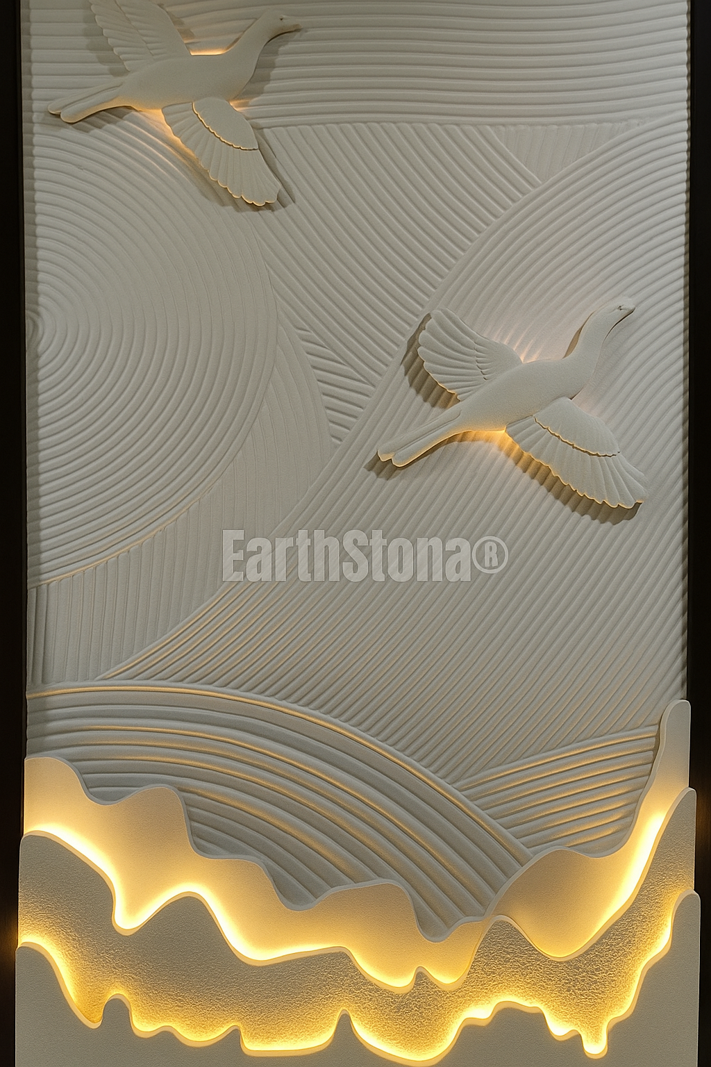 Birds waves mountain stone wall carving, India, UK, Canada