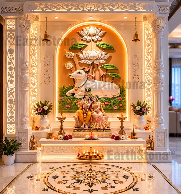 EarthStona luxury white marble mandir with Kamadhenu cow mural, lotus backdrop, Radha Krishna idol, carved pillars and warm LED lighting in elegant bungalow