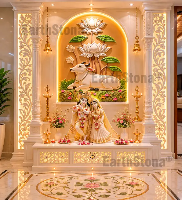 EarthStona luxury white marble mandir with Kamadhenu cow mural, lotus backdrop, Radha Krishna idol, carved pillars and warm LED lighting in elegant bungalow